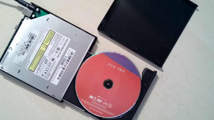 Insert DVD into Disc Drive